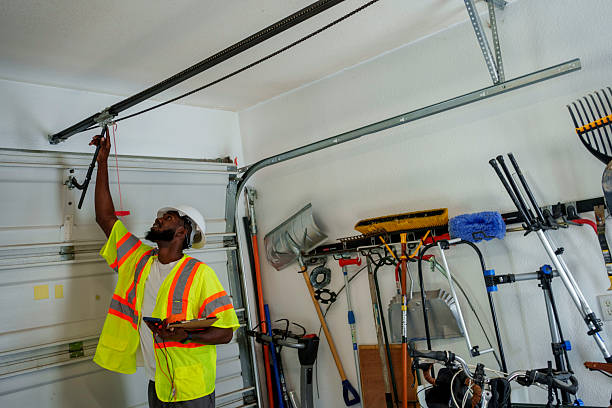 Professional Garage Door Panel Replacement technician working in Marlene Village, OR
